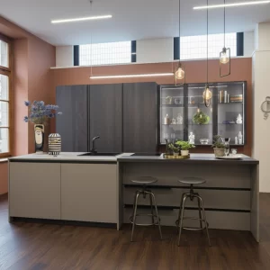 Cucina moderna con isola centrale e pensili scuri in laminato vista 3
